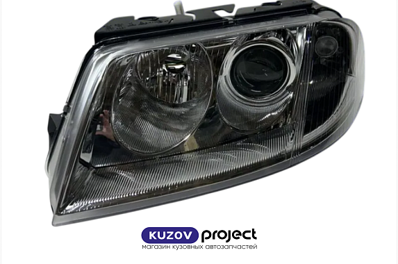 Фара левая под электрический корректор Volkswagen Passat (B5+) 2000-2005 (TYC / Тайвань)