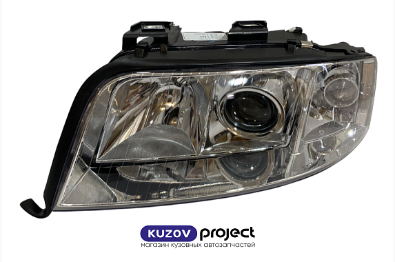 Фара левая под электрический корректор Audi A6 2001-2004 (TYC)